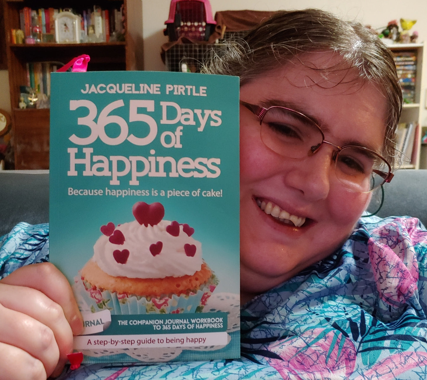 Close-up of the journal's spiral binding and textured cover with subtle embossed patterns in soft pastel colors.